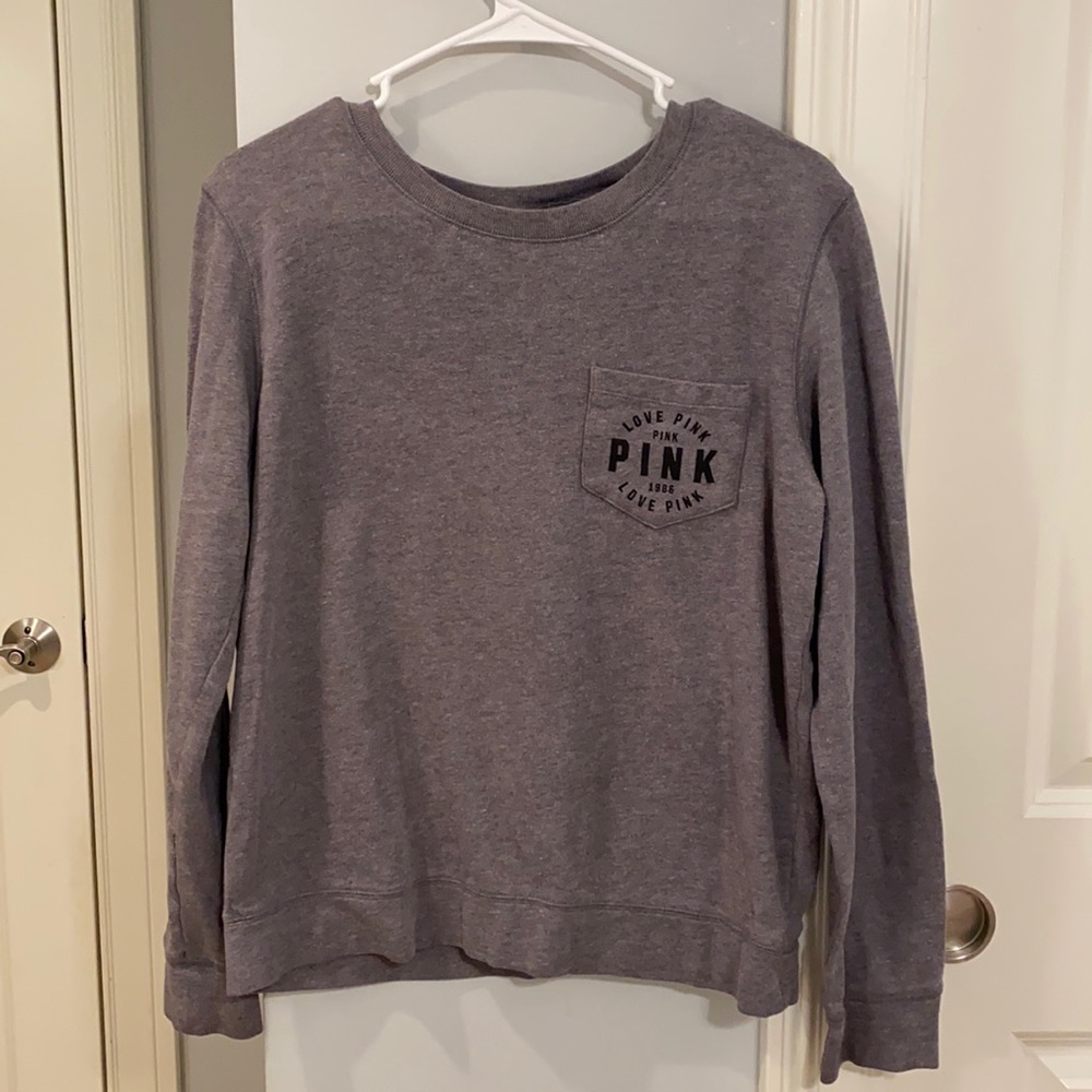 Woman’s gray sweat shirt
